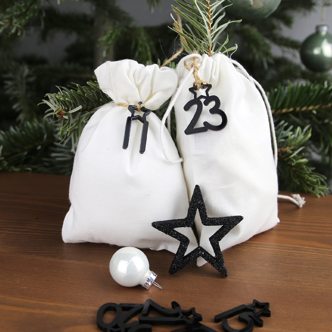 Adventskalender Zahlen Anhänger 1-24 zum Basteln Adventskalendersäckchen Nummern Sternchen schwarz/weiß